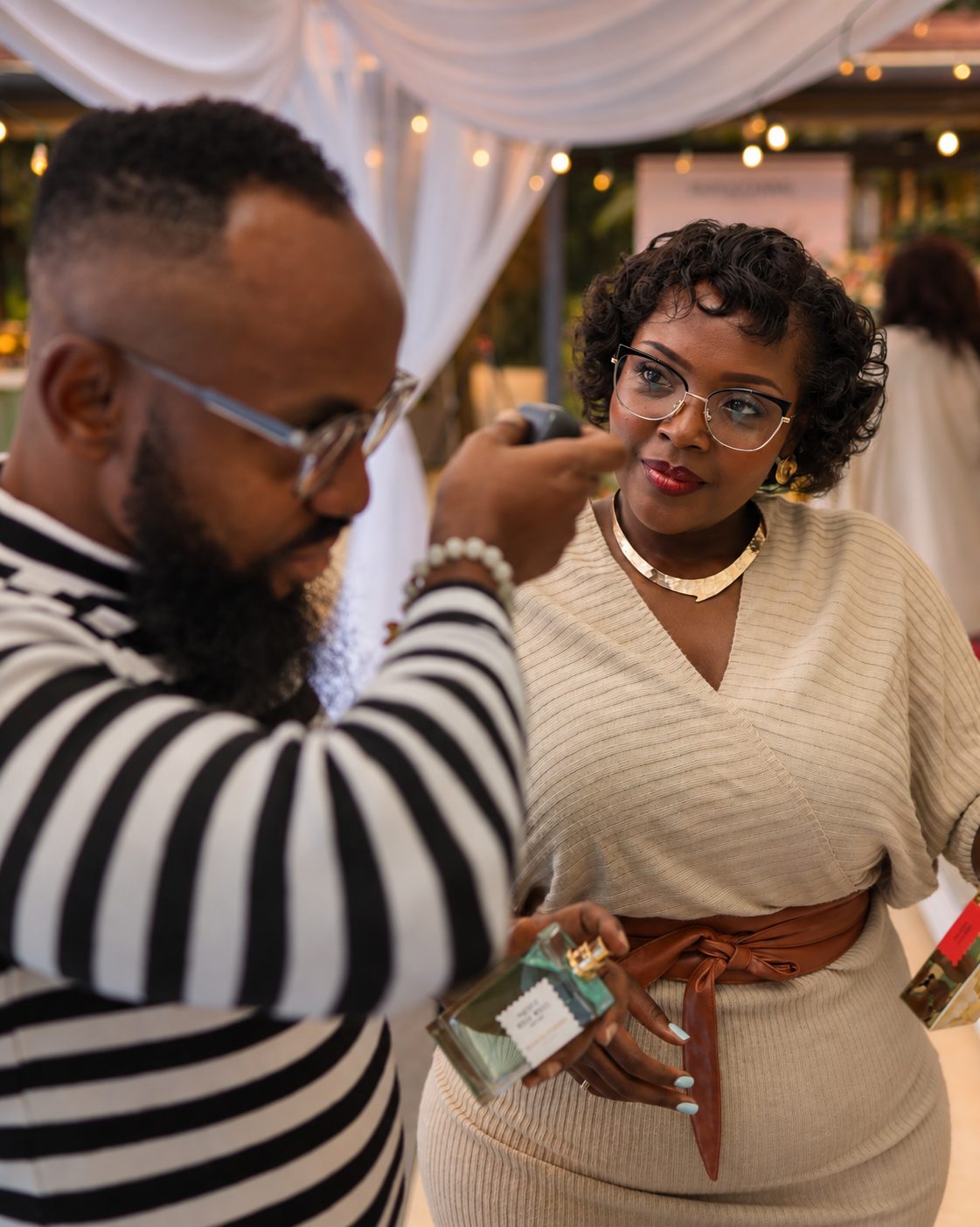 Guests discovering fragrances together at a Feel Nzuri event